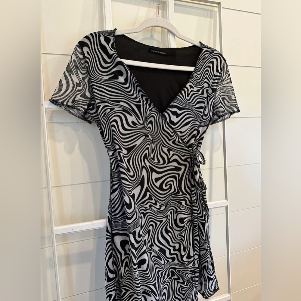 Caution to the Wind Mesh Black & White Swirl Wrap Dress